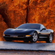 A promotional image of a C5 Corvette, viewed from the front quarter angle.